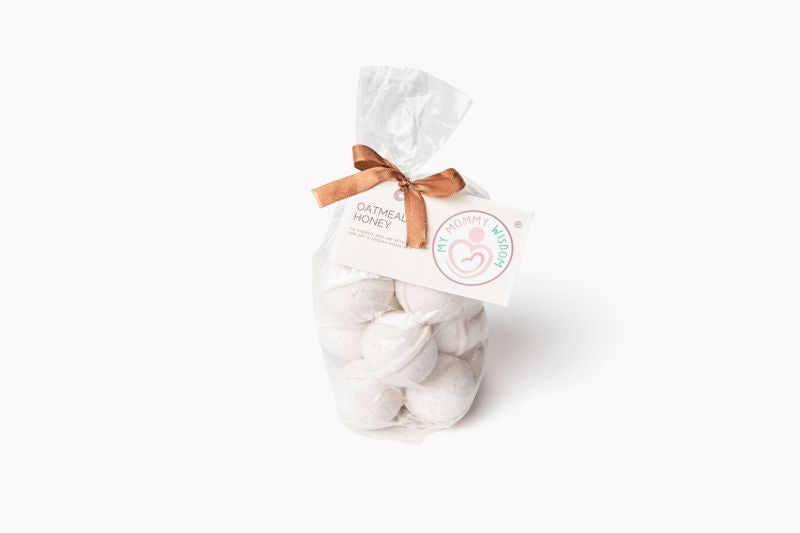 Bag of My Mommy Wisdom Oatmeal Milk & Honey Bath Bombs with a white background